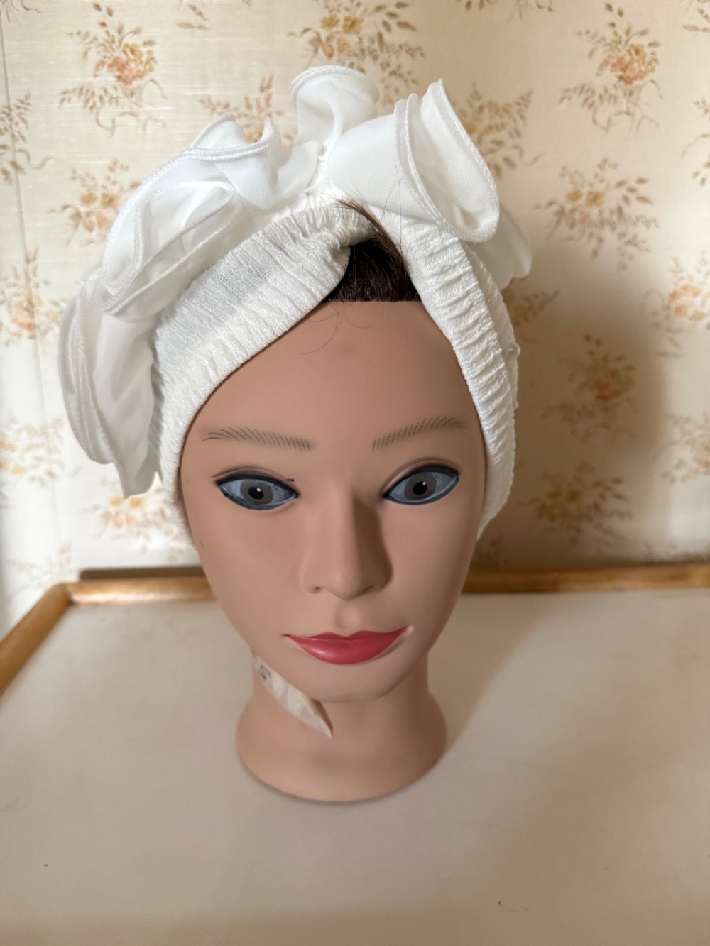 Beautiful white stretch women's turban with organza rosettes
